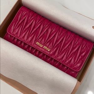 NEW! Miu miu long flap wallet (authentic)